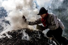 charcoal pile, charcoal burner