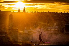 filming of Andersen's fairy tale The Shepherdess and the Chimney Sweep on the roofs of the Lucerna Palace in Prague, acrobatics