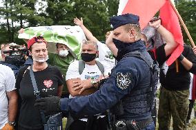 hundreds of people protest against Polish Turow mine extension, Polish proponents of expansion, Polish police officer