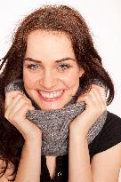 A beautiful young woman, lady, girl, cold, scarf, smile