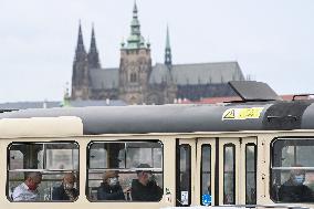 passengers with protective face masks in Prague tram, Prague Castle, face mask