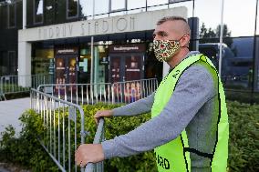 The security man guards by entrance to the Ander Stadium (Andruv Stadion