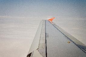 easyJet plane Airbus A319, clouds