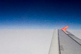 easyJet plane Airbus A319, clouds