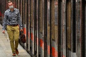 man, face masks, coronavirus, COVID-19, Prague, metro, Muzeum station