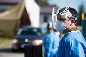 instructional video how to vote in quarantine covid-19, from car, face mask