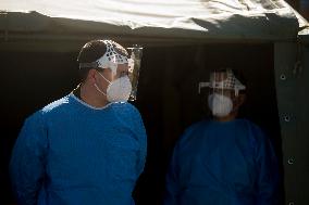 instructional video how to vote in quarantine covid-19, from car, face mask