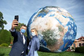 A giant inflatable model of the planet Earth, garden of Czernin Palace