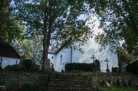 The Church of Saint Maurice, Mourenec, graveyard