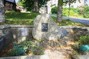 A monument to the 32 destroyed municipalities and settlements of Prasily district