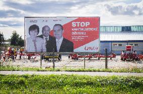 Alena Nohavova, Vilem Klapsia, Radek Nejezchleb, KSCM (communists), billboard