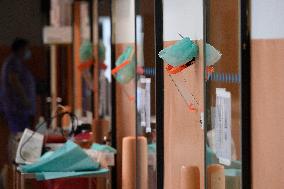 A medic nurses a patient at Intensive Care Unit