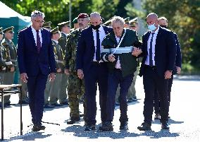 Lubomir Metnar, Ales Opata, Milos Zeman bestowing of a combat flag and the honorary name of Major General Josef Duda on the 533rd Battalion Unmanned Systems