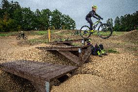 pump track circuit for cyclists, cyclist