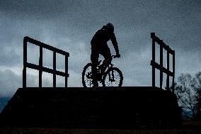 Tomas Slavik, pump track circuit for cyclists, cyclist, silhouette