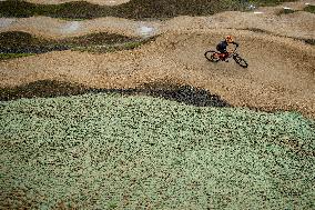 pump track circuit for cyclists, cyclist