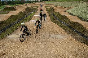 pump track circuit for cyclists, cyclist