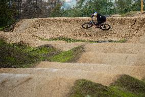 pump track circuit for cyclists, cyclist