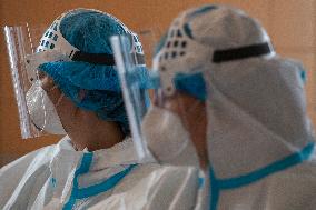 Medical staff, coronavirus covid-19 infected patient in General University Hospital in Prague
