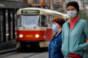 public transport stops, people, face masks, coronavirus, COVID-19, Prague