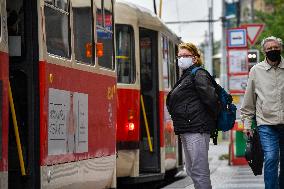 public transport stops, people, face masks, coronavirus, COVID-19, Prague