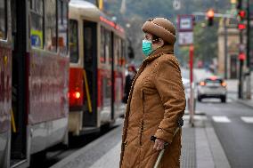 public transport stops, people, face masks, coronavirus, COVID-19, Prague