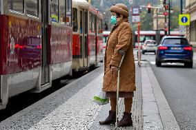 public transport stops, people, face masks, coronavirus, COVID-19, Prague