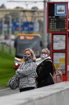 public transport stops, people, face masks, coronavirus, COVID-19, Prague