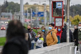 public transport stops, people, face masks, coronavirus, COVID-19, Prague