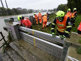 Firefighters build flood-protection walls, river Becva