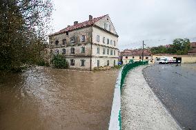 River Novohradka, village Luze, heavy rain, raised water level