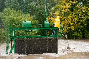 River Novohradka, village Luze, heavy rain, raised water level