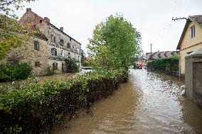 River Novohradka, village Luze, heavy rain, raised water level