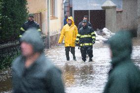 River Novohradka, village Luze, heavy rain, raised water level