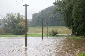 River Novohradka, village Luze, heavy rain, raised water level