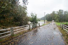 River Novohradka, village Luze, heavy rain, raised water level