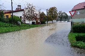 Heavy rainfalls, flood, River Becva, village Usti