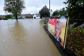 Heavy rainfalls, flood, River Becva, village Usti