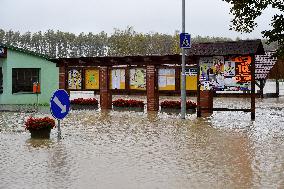 Heavy rainfalls, flood, River Becva, village Usti