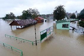 Heavy rainfalls, flood, River Becva, village Usti