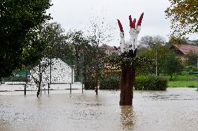 Heavy rainfalls, flood, River Becva, village Usti