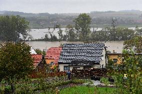 Heavy rainfalls, flood, River Becva, village Usti