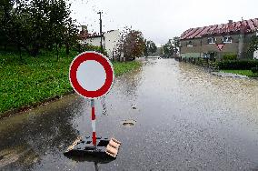 Heavy rainfalls, flood, River Becva, village Usti