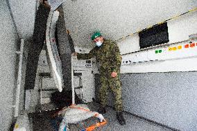 loading of equipment for field hospital, operation room, soldier