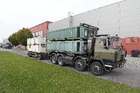 Military convoy with equipment for field hospital, container