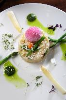 Italian risotto, asparagus, leek, vegetarian food, plate