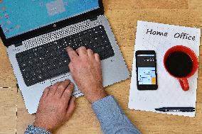 Home Office Business Desk, Table, computer, hands, notebook, headphone, pencil, smartphone, coffee