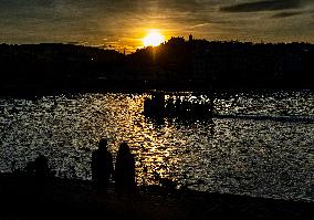 People, city center, Prague, Vltava River, Boat, sun set