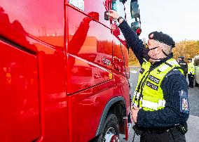 Police and customs officers are checking vehicles over illegal migration on the D8 motorway