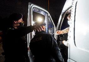 Police and customs officers are checking vehicles over illegal migration on the D8 motorway